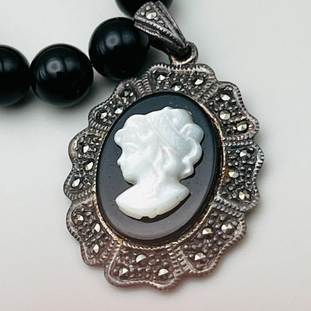 Vintage Mother of Pearl Cameo Sterling Silver Marcasite Frame Black Beaded Chain